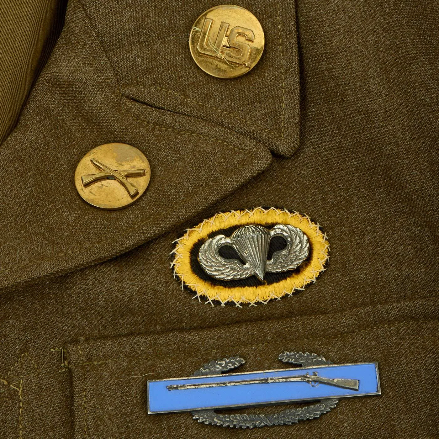 Original U.S. WWII 187th Glider Infantry Regiment (GIR) Named Ike Jacket and Hand Painted B-4 Bag