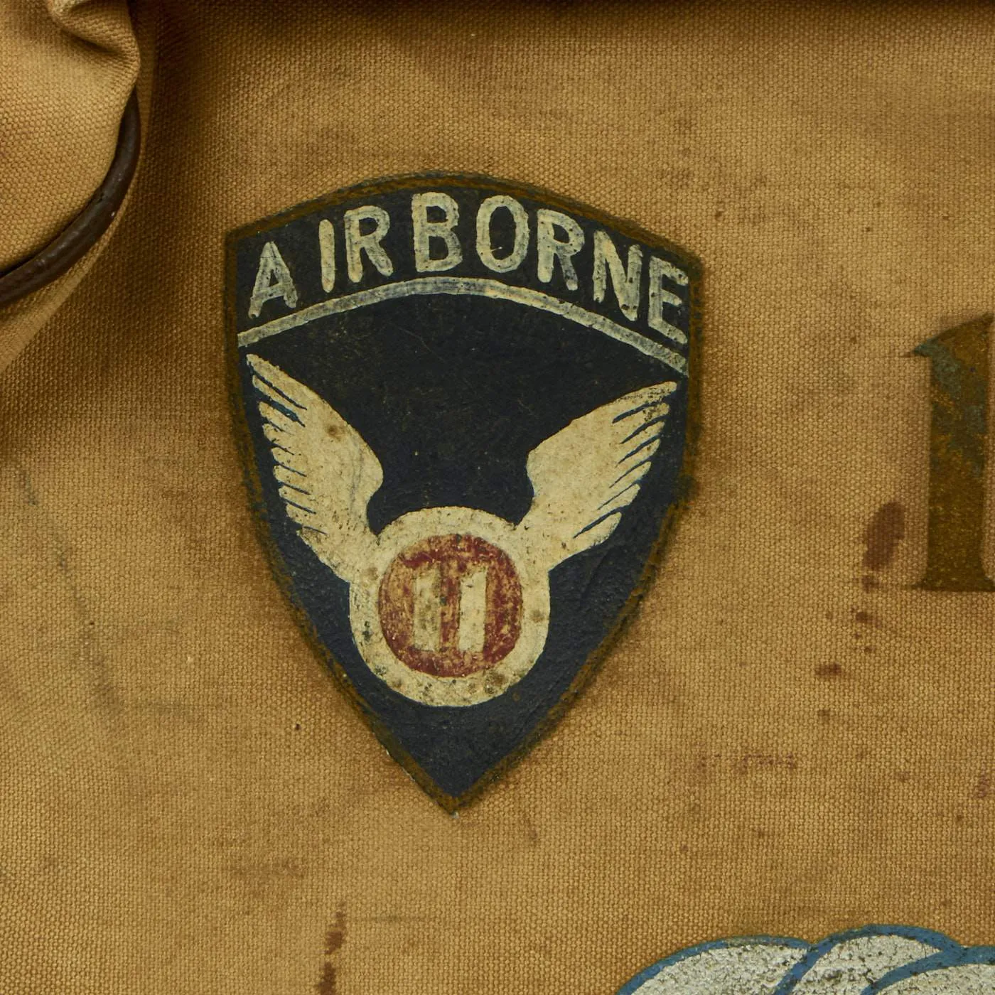 Original U.S. WWII 187th Glider Infantry Regiment (GIR) Named Ike Jacket and Hand Painted B-4 Bag