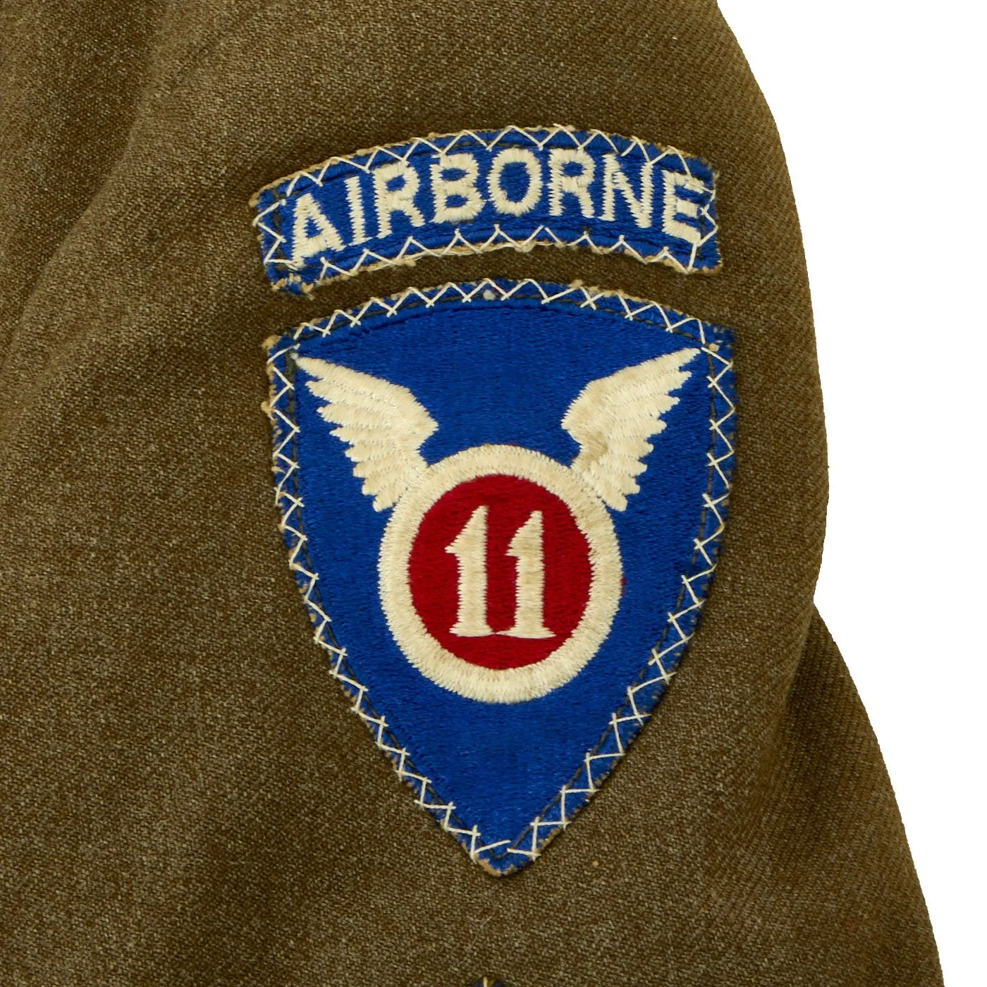 Original U.S. WWII 187th Glider Infantry Regiment (GIR) Named Ike Jacket and Hand Painted B-4 Bag