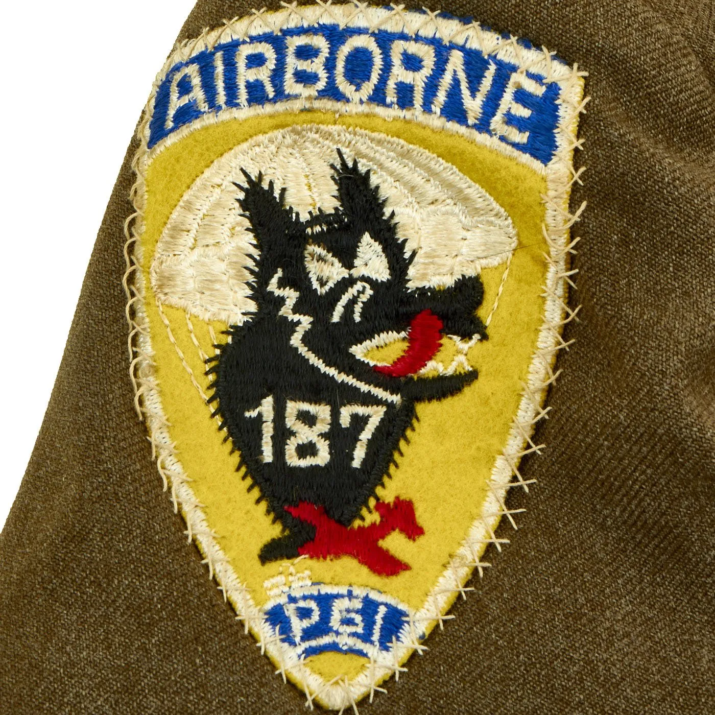 Original U.S. WWII 187th Glider Infantry Regiment (GIR) Named Ike Jacket and Hand Painted B-4 Bag